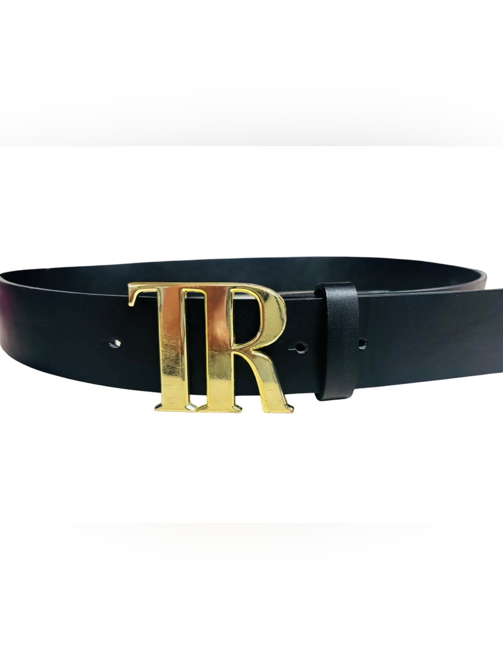 Black True Religion TR gold buckle belt with a polished metallic "TR" logo.